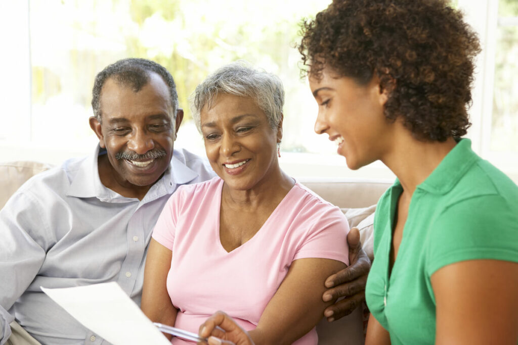 Proveer at Grande View | Senior couple reviewing their financial options with a professional